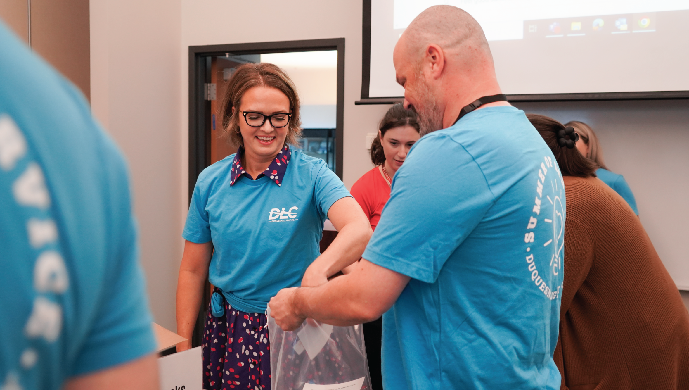 DLC employees assembling care packages