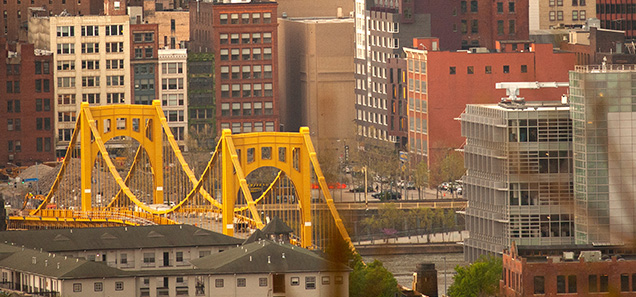 Pittsburgh city skyline yellow bridge