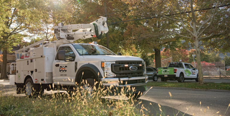 DLC bucket truck parked on residential street