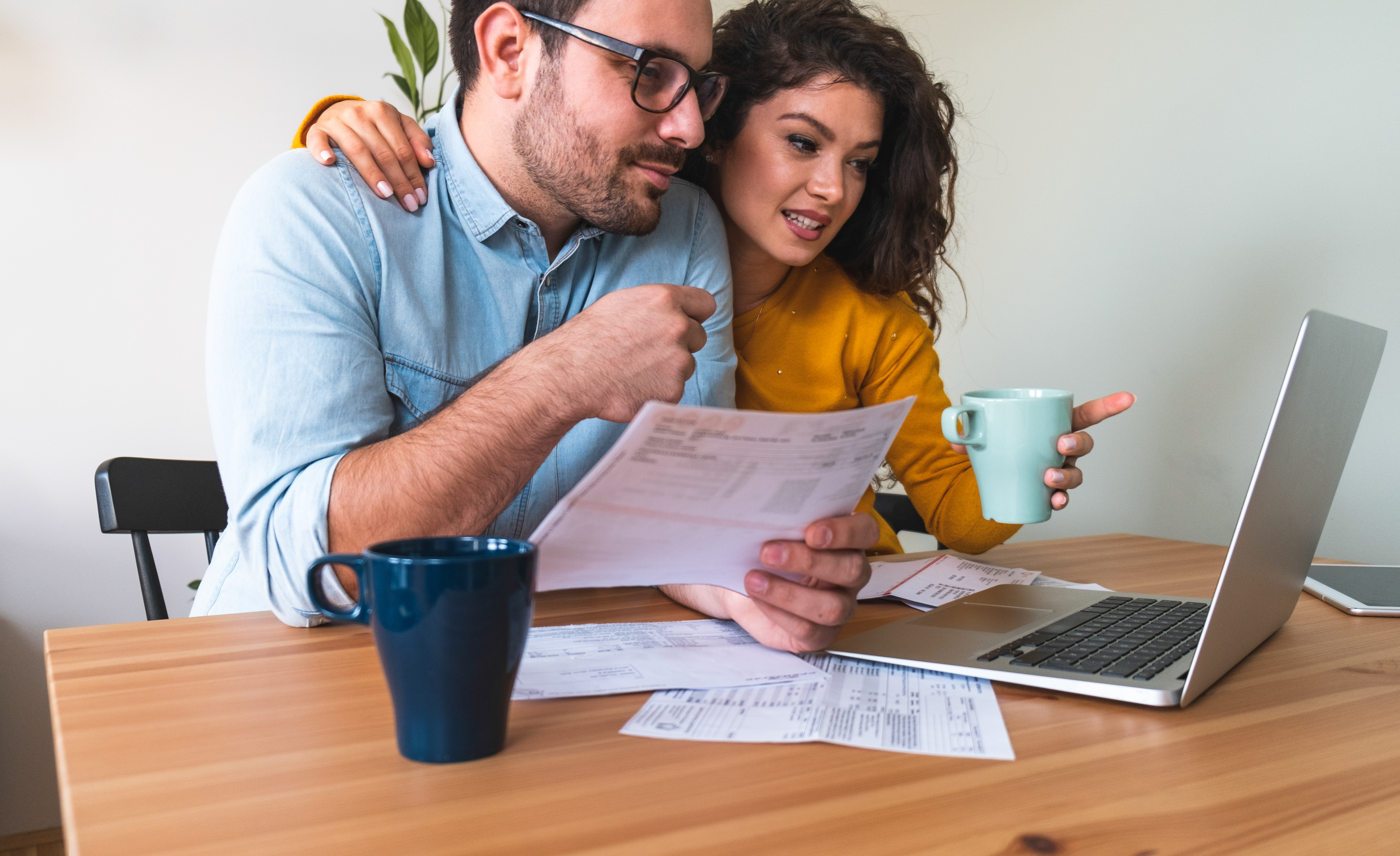 PTC Standalone Couple Paying Bills