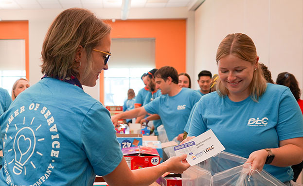 DLC employees assembling care packages
